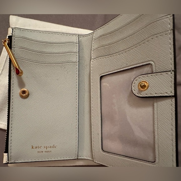 Kate Spade
Morgan Matchbox Embossed Small Slim Bifold Wallet
$118 - Picture 5 of 5